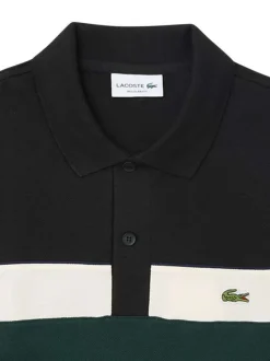 Polo en coton noir uni à coupe droite avec un col à revers boutonné