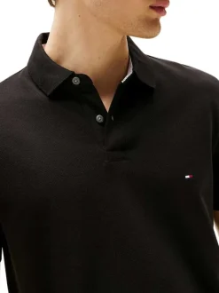 Polo en coton noir uni à coupe regular fit avec le logo brodé en petit