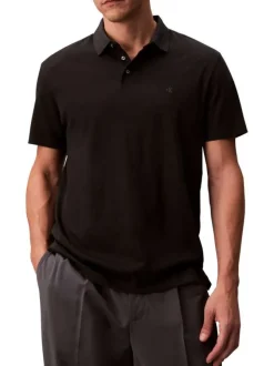 Polo en coton noir uni à coupe regular fit avec le mini logo brodé