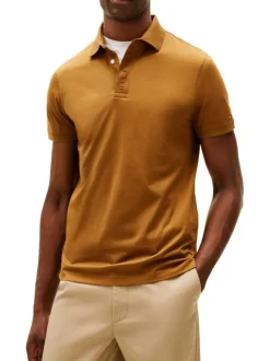 Polo en coton orange à coupe ajustée pourvu d'un col boutonné