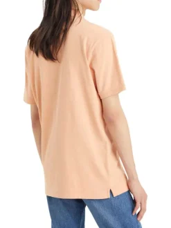 Polo en coton orange uni avec un col boutonné et une coupe droite