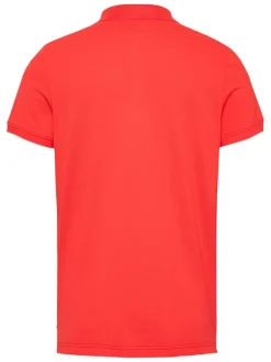 Polo en coton régénératif orange uni avec une coupe droite, col boutonné et logo