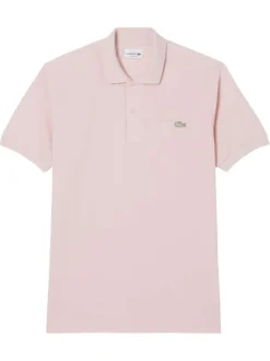 Polo en coton rose avec un col boutonné et des manches courtes