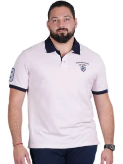Polo en coton rose en maille piquée avec une coupe droite et un col à revers