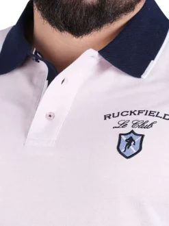 Polo en coton rose en maille piquée avec une coupe droite et un col à revers