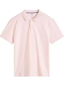 Polo en coton rose uni avec une coupe droite et un col boutonné