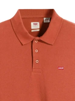 Polo en coton rouille en maille piquée à coupe droite avec des manches courtes