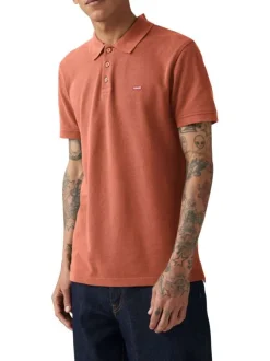 Polo en coton rouille en maille piquée à coupe droite avec des manches courtes