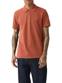 Polo en coton rouille en maille piquée à coupe droite avec des manches courtes