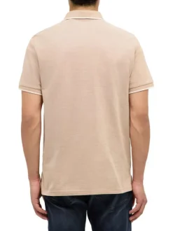 Polo en coton tabac uni pourvu d'un col boutonné et d'une coupe droite