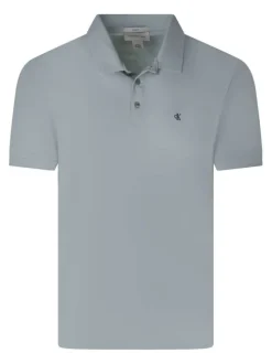 Polo en coton vert d'eau à coupe droite pourvu d'un col boutonné