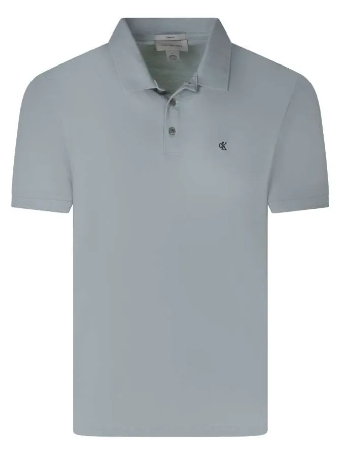 Polo en coton vert d'eau à coupe droite pourvu d'un col boutonné