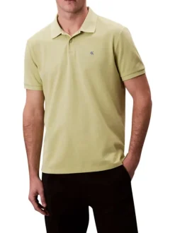 Polo en coton vert pistache uni à coupe slim avec le logo brodé en petit