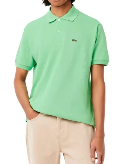Polo en coton vert uni avec une coupe regular fit et le petit crocodile brodé