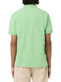 Polo en coton vert uni avec une coupe regular fit et le petit crocodile brodé