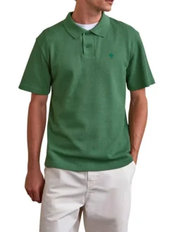 Polo en coton vert uni avec un logo brodé et un col boutonné