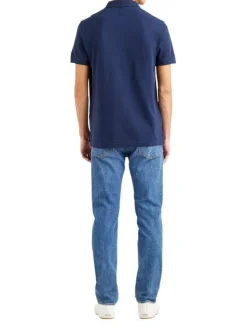 Polo en maille piquée de coton bleu marine à col boutonné et Batwing poitrine