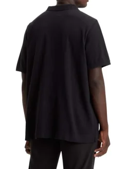 Polo en maille piquée de coton noir uni à col boutonné et Batwing poitrine