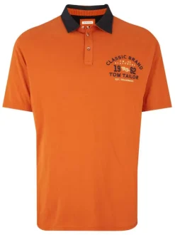 Polo grande taille en coton orange avec logo brodé en marine sur la poitrine coupe droite