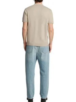 Polo manches courtes en coton beige en maille à coupe regular et col à revers