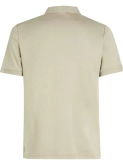 Polo à manches courtes en coton beige uni avec une coupe ajustée