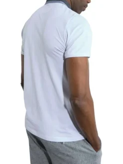 Polo à manches courtes en coton blanc uni à coupe droite et col boutonné