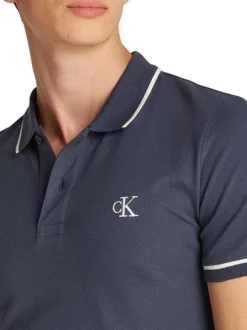 Polo à manches courtes en coton bleu marine uni à coupe ajustée