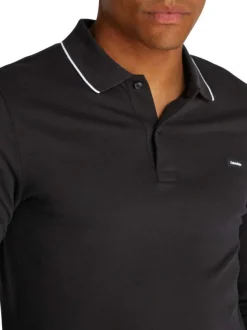 Polo à manches longues en coton noir uni à coupe ajustée avec des liserés blancs