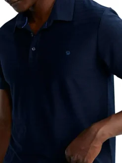Polo marine à rayures pourvu de manches courtes et d'un col boutonné