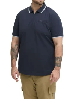 Polo marine uni avec une coupe droite, un col zippé et des manches courtes
