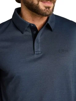 Polo marine uni pourvu de manches courtes et d'un col boutonné