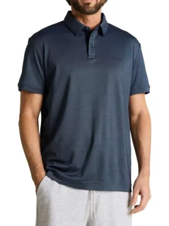 Polo marine uni pourvu de manches courtes et d'un col boutonné