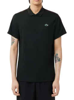 Polo noir à coupe droite un col boutonné et une bande monogramme aux épaules