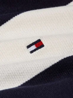 Polo noir rayé en coton avec une coupe droite et deux boutons sur le devant