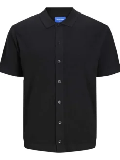 Polo noir uni coupe droite col français et des manches courtes