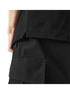 Polo Paris en coton noir uni coupe droite col boutonné et manches resserrées