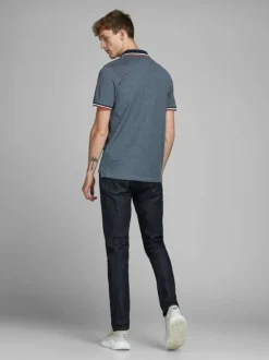Polo pour homme bleu uni en coton avec une coupe droite et un col boutonné