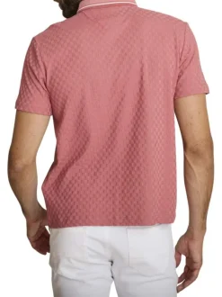 Polo rose à coupe droite pourvu d'un col boutonné et de manches courtes