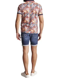 Polo rouille à imprimé fleurs bleues et jaunes avec une coupe droite