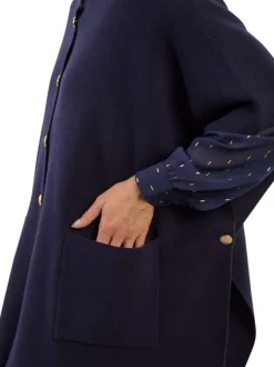 Poncho marine en maille fine avec des boutons dorés et 2 poches plaquées