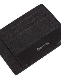 Porte-cartes en cuir noir uni avec un touché grainé et une poche zippée