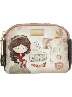 Porte-monnaie beige avec des imprimés et une fermeture à zip