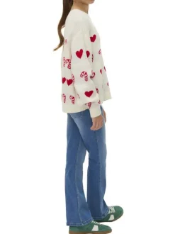 Pull écru tricoté avec des motifs de sucres d'Orge et de coeurs rouges