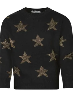 Pull noir doux avec des étoiles pailletées une coupe droite et un col rond
