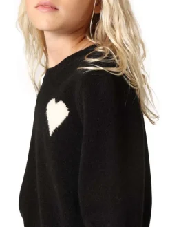 Pull noir en maille tricotée avec un col rond et des manches longues