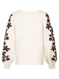 Pull beige brodé avec un col v et des manches longues
