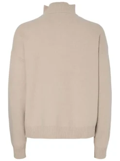 Pull beige uni avec un col montant zippé et des manches longues