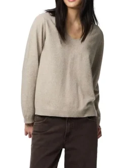 Pull beige uni avec une coupe droite et des manches longues