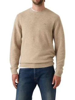 Pull beige uni en laine avec un col rond et logo de la marque sur la poitrine