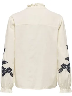 Pull beige uni pourvu de manches longues et d'une coupe droite
